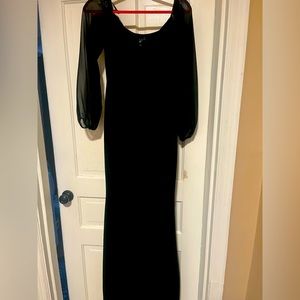 Beautiful, black gown! Worn once,like new! It’s perfect for a special occasion.